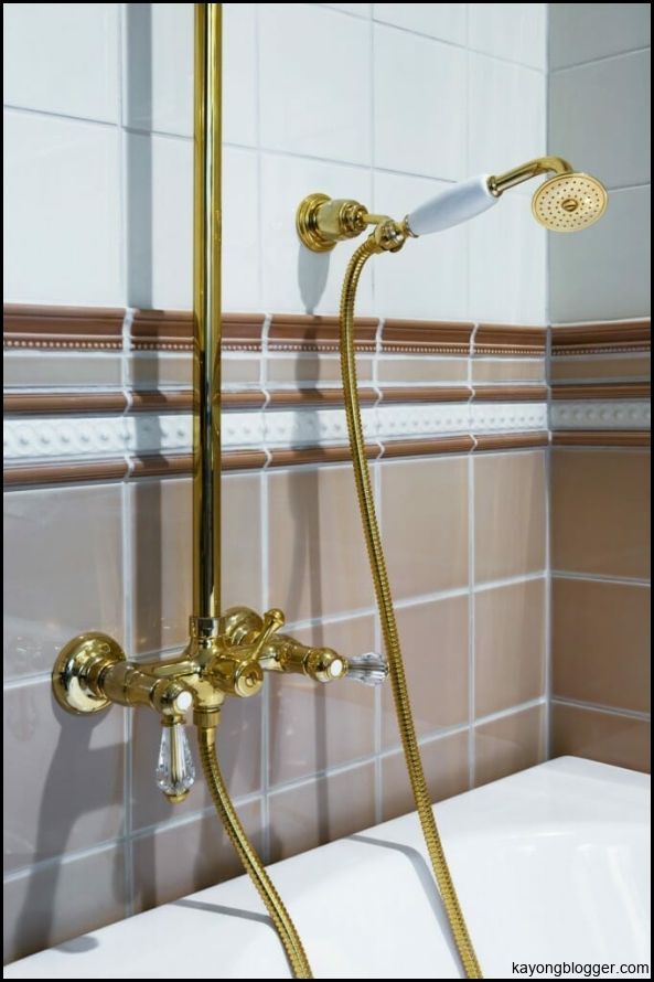 Glam Up Your Bathroom with Gold Fixtures